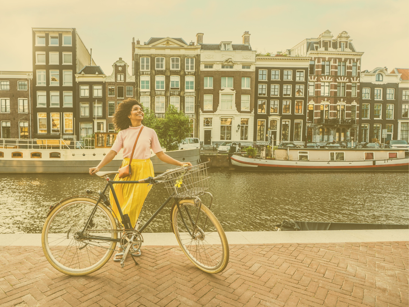 Happy Woman In Amsterdam With Bike 2