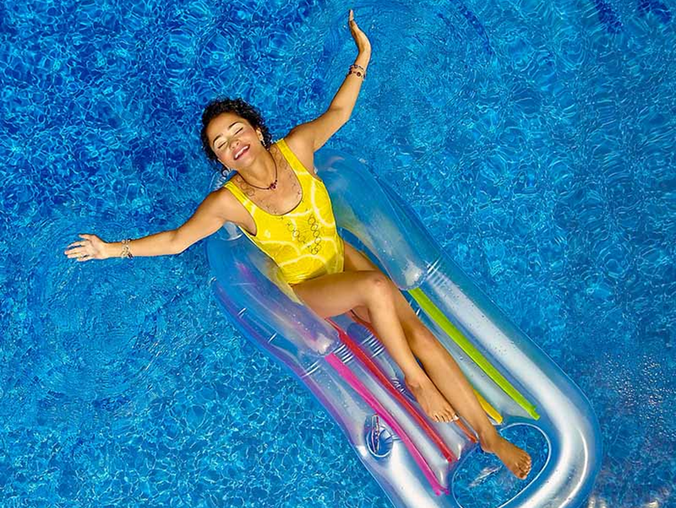 Woman Sunbathing On A Float Preview 1386X1042
